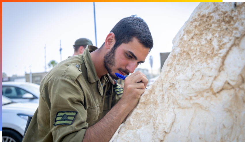 An IDF soldier about to head into Gaza in October writes a prayer to be put in the Kotel
