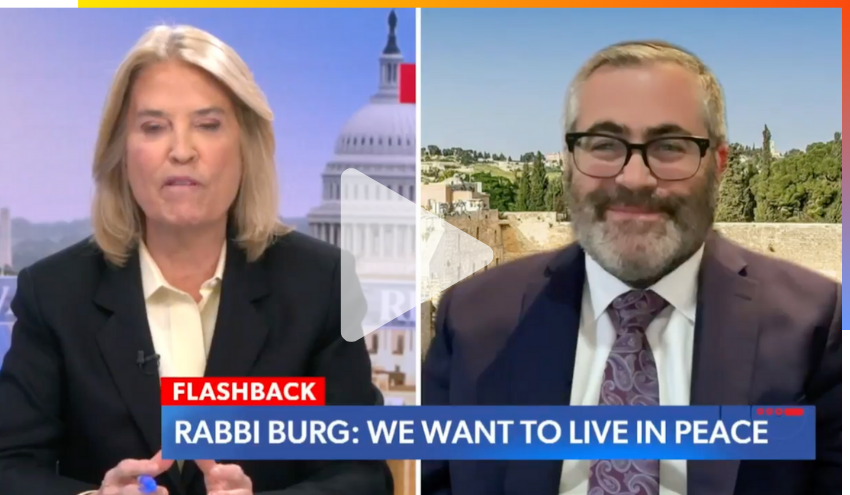 Rabbi Steven Burg having a meaningful conversation with Greta Van Susteren.