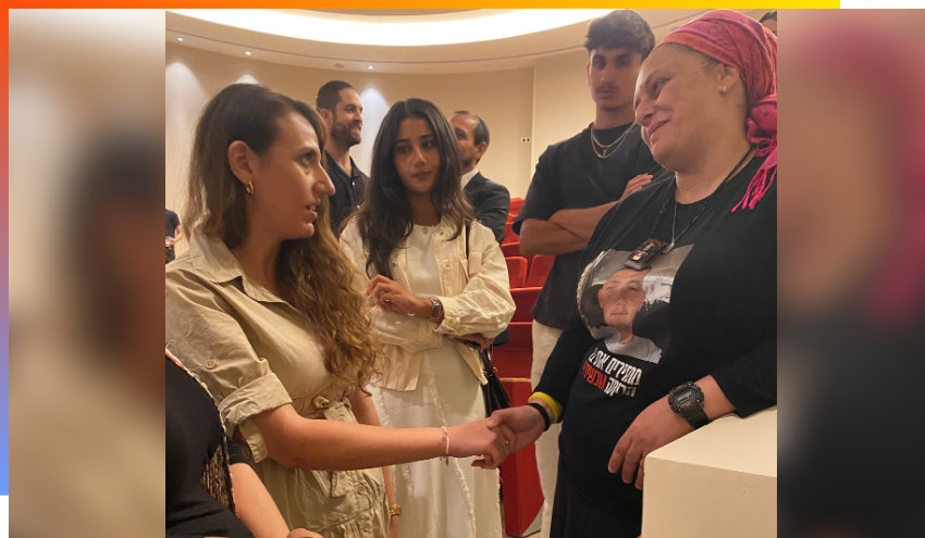 Julie Kupershtein talking with some of the attendees following the film's screening.