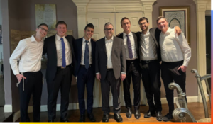 From left to right: Daniel Greenblatt, Noah Krup, Jared Stern, Rabbi Steven Burg, Manny Nagel, Jordy Chowaiki, Jack Meyer.