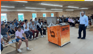 Rabbi Burg speaking at camp Mesorah