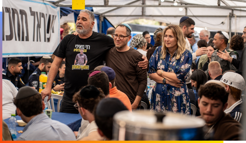 Itzik Gvili, father of Ran, the last Israeli hostage to be released from Gaza, stands with Dani (center) and Bari Erber.
