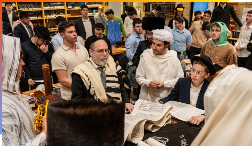 Rabbi Rosman reading the Megillah at the Aish Yeshiva.