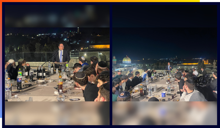 Rabbi Uri Pilichowski addresses Aish students on the rooftop of the Dan Family Aish World Center on the eve of Yom Ha’atzmaut.