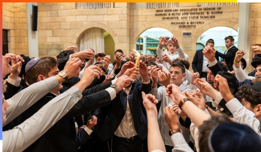 Aish students participating in Havdalah after a Shabbos in Yeshiva.