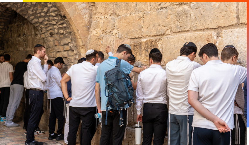 Aish students praying at the Kotel prior to Shavuot.