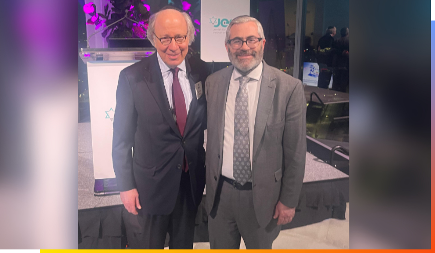 Rabbi Steven Burg (right) with Jake Aronov.