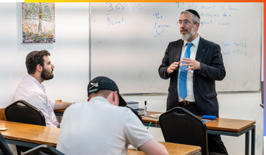 Rabbi Ephy Greene teaches a group from the Aish Summer Leadership program this week.
