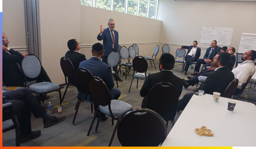 Rabbi Burg addresses gathered Aish Branch leaders at the Shevatim Conference
