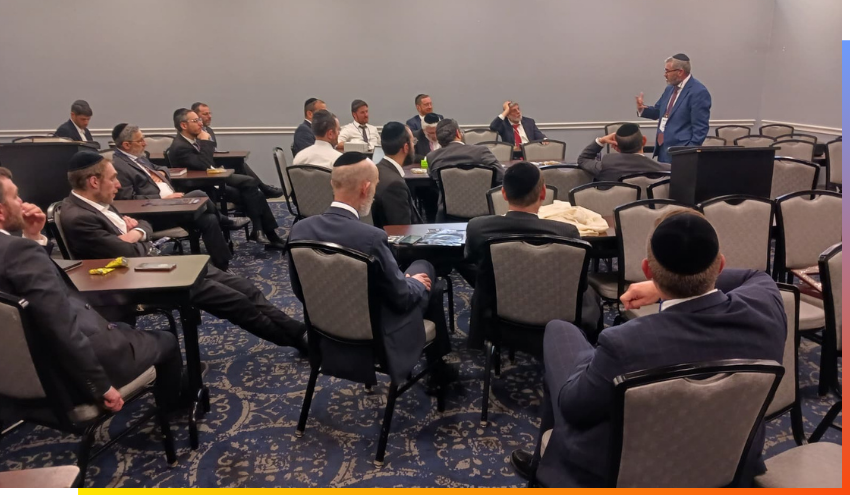 Rabbi Burg speaking to Jewish leaders at the Shevatim Conference
