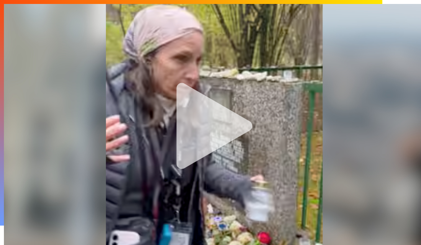  Rachel Burg speaking in the forest mass grave