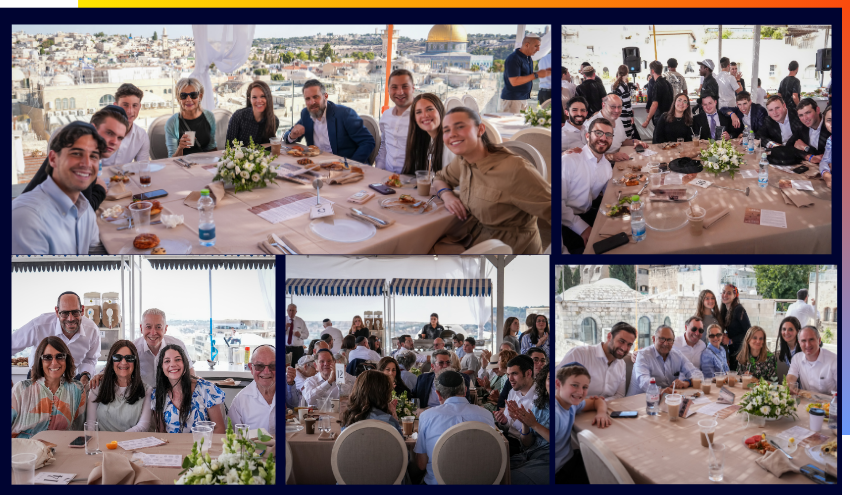 Families of Pillars and supporters together on the Dan and Hytman Family Aish World Center rooftop on Chol Hamoed Sukkot